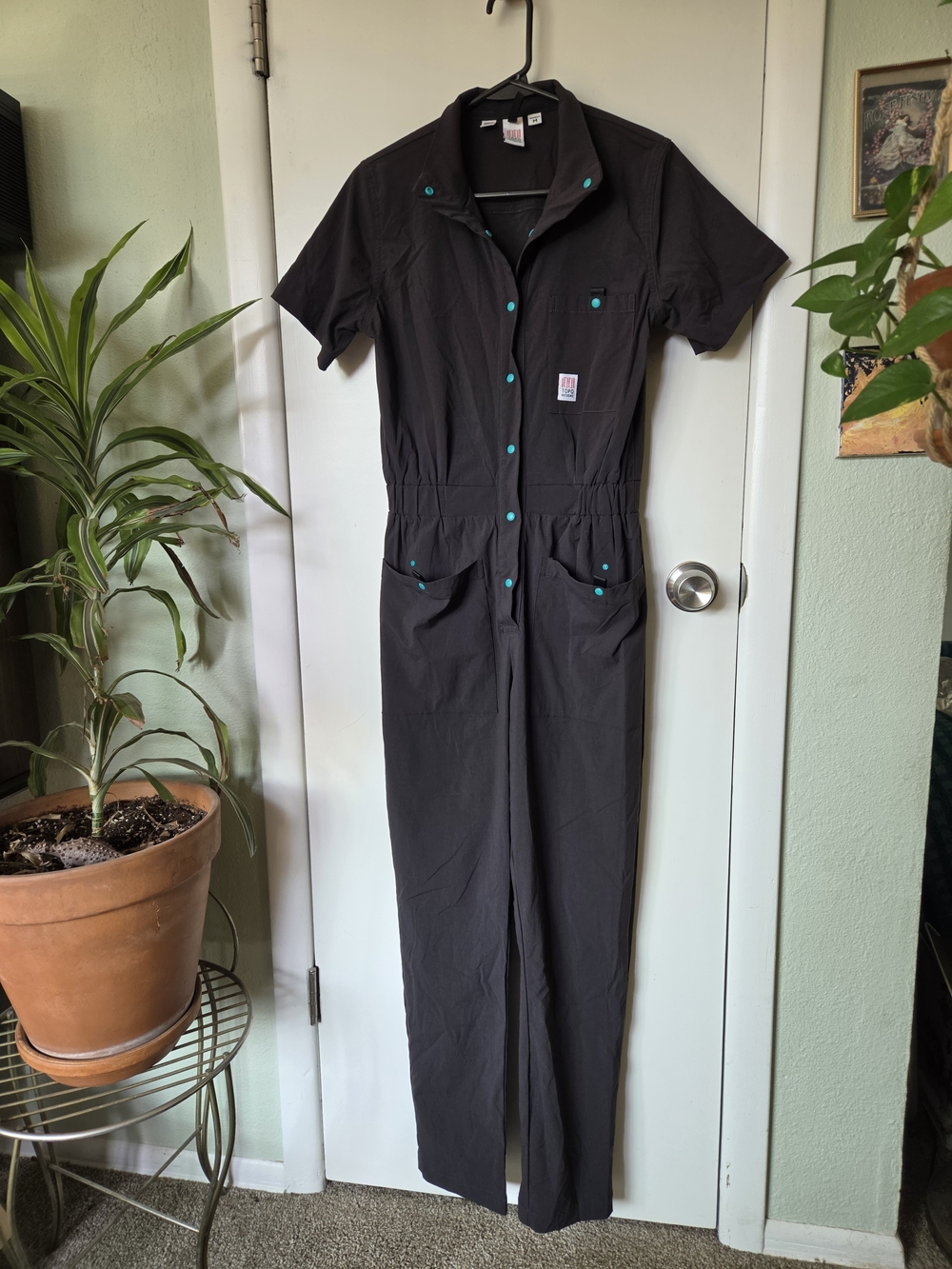 Topo Designs Black Short-Sleeve Utility Jumpsuit with Teal Snap Buttons